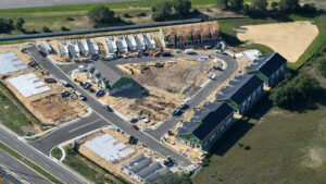aerial view of construction in progress on champions chase homes in davenport florida by kimaya real estate developers