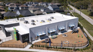 aerial view of fenced in playground area at amazing explorers westchase in tampa florida by kimaya