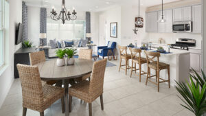 photo of open kitchen dining room and seating area at build to rent property valencia isle by kimaya
